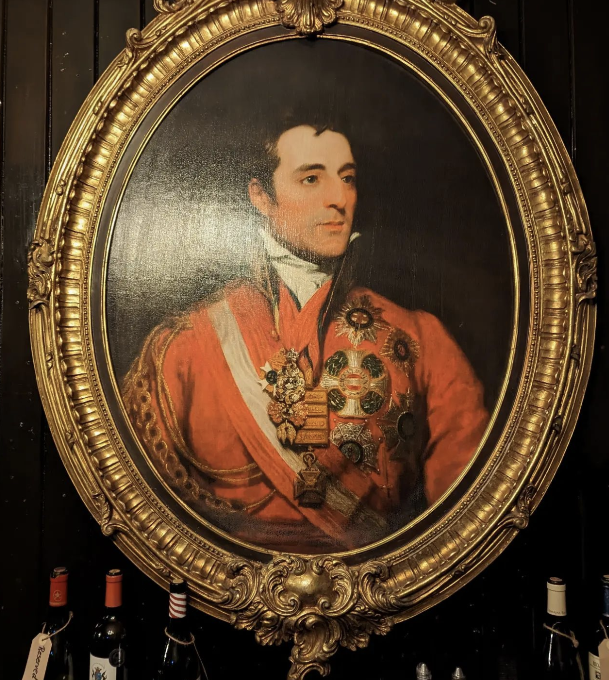A painting, believed to be of Cedric, hangs in the pub